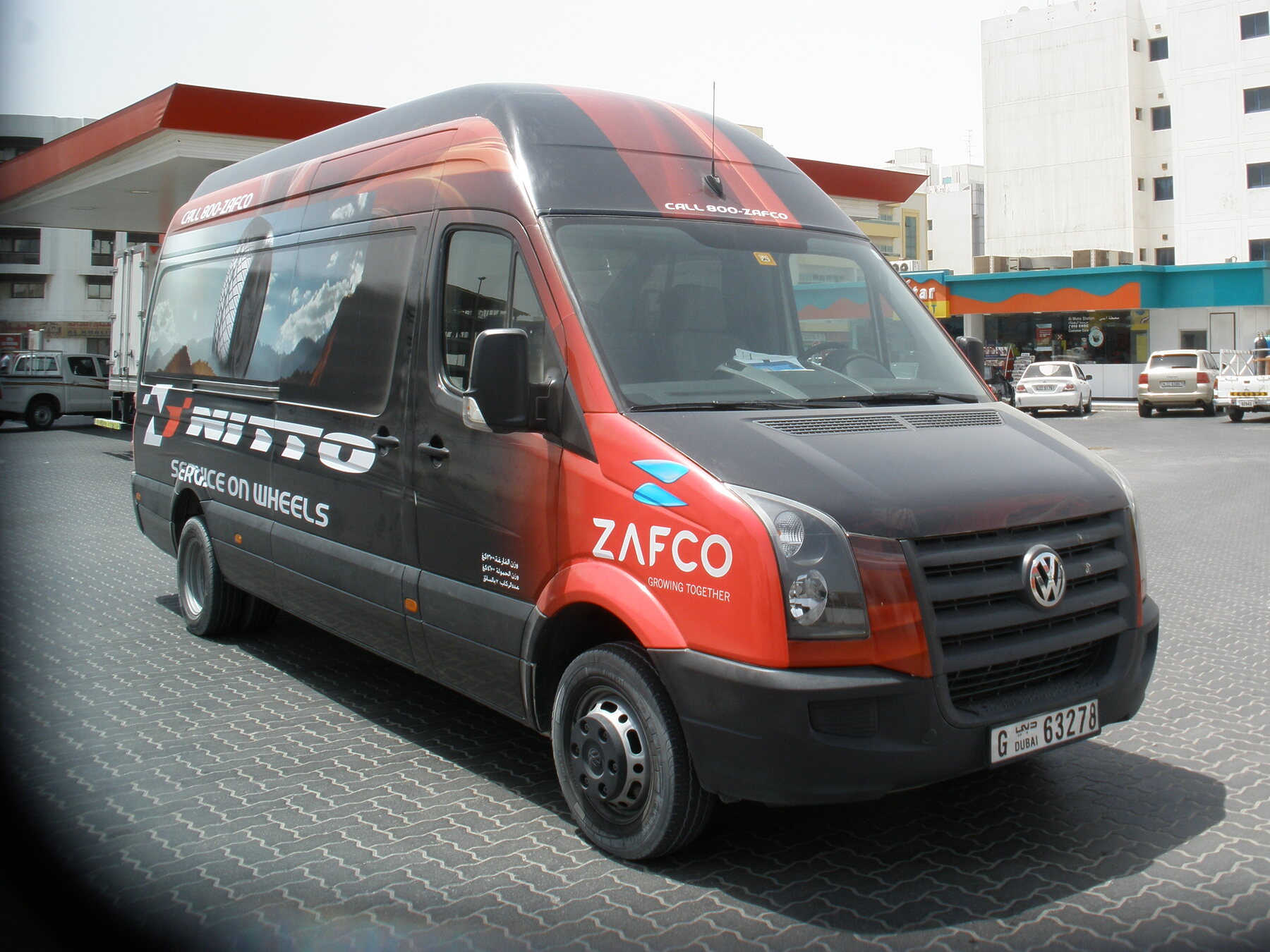 ZAFCO commercial van with red and black fleet graphics